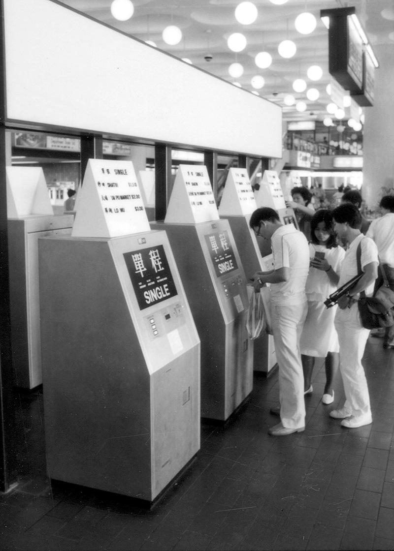 Customer at ticket machine