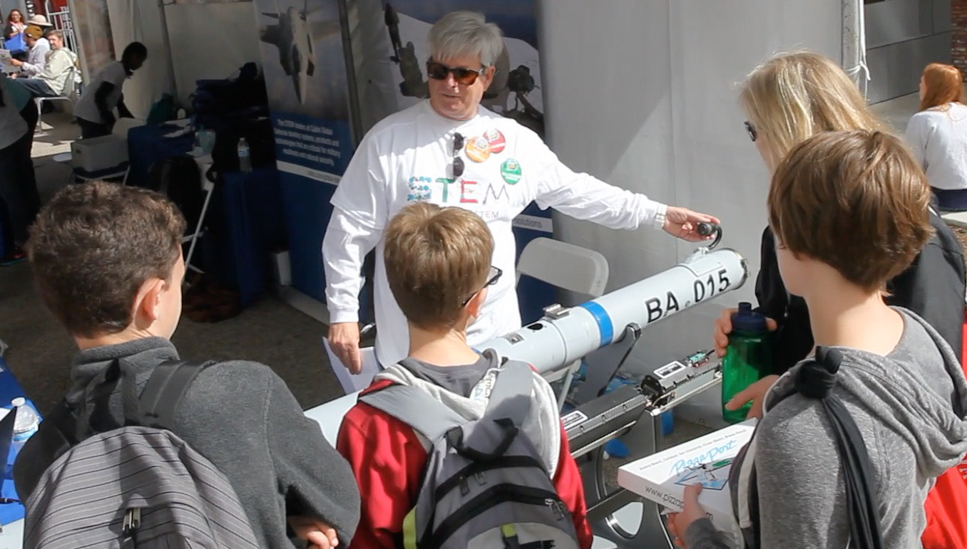 Cubic Engineer John Dill teaches kids how STEM helps trains pilots