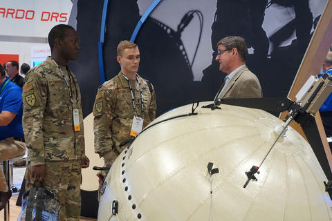 Warfighters learn about Cubic's GATR antenna system at SOFIC